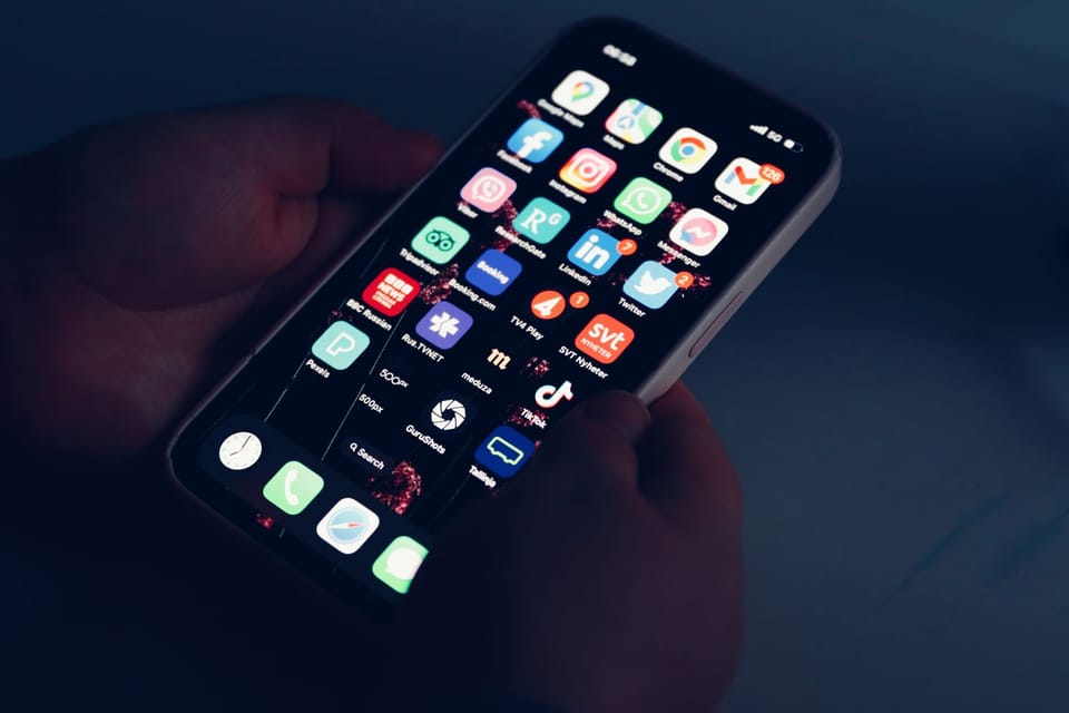 Holding a phone showing an app