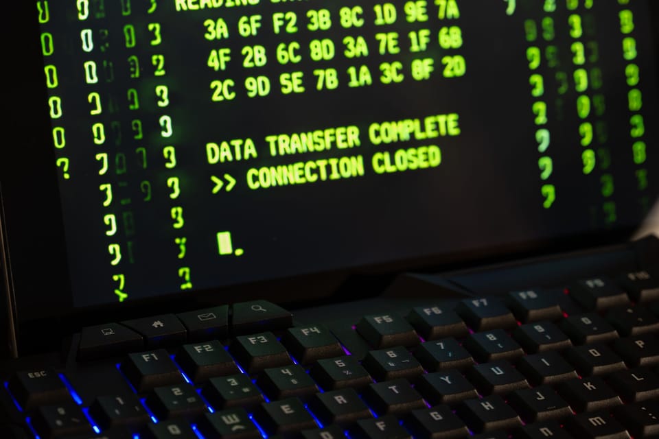 Working on a laptop with a security prompt